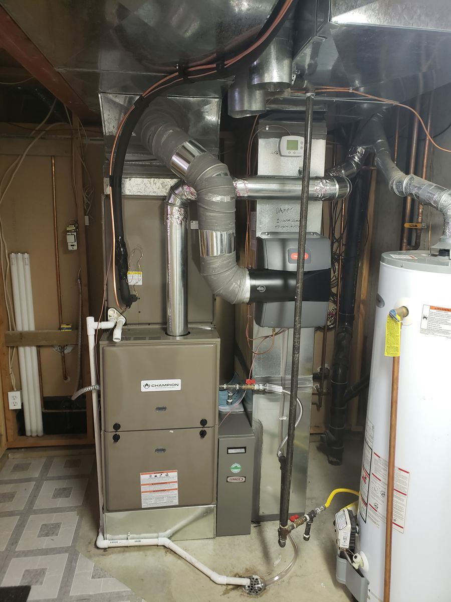 New Champion furnace installed with whole-home humidifier and sealed ductwork